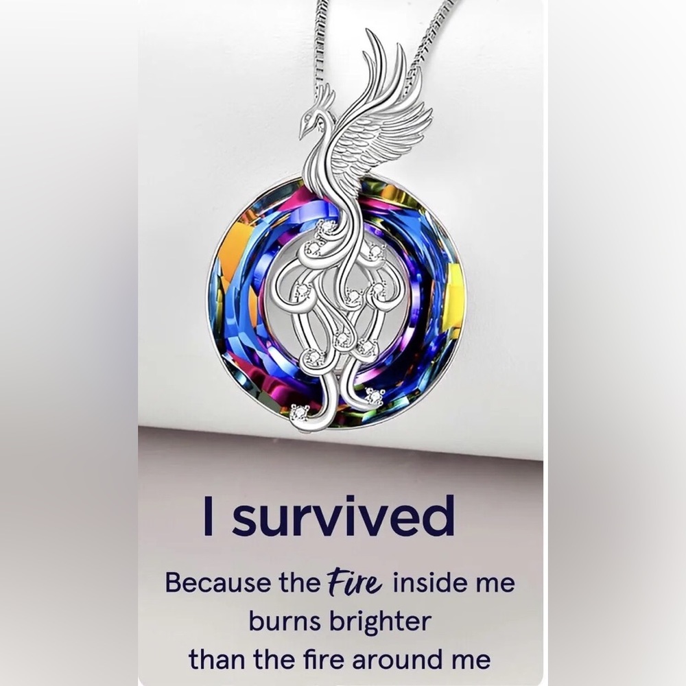 Crystal Phoenix pendant necklace. I survived because